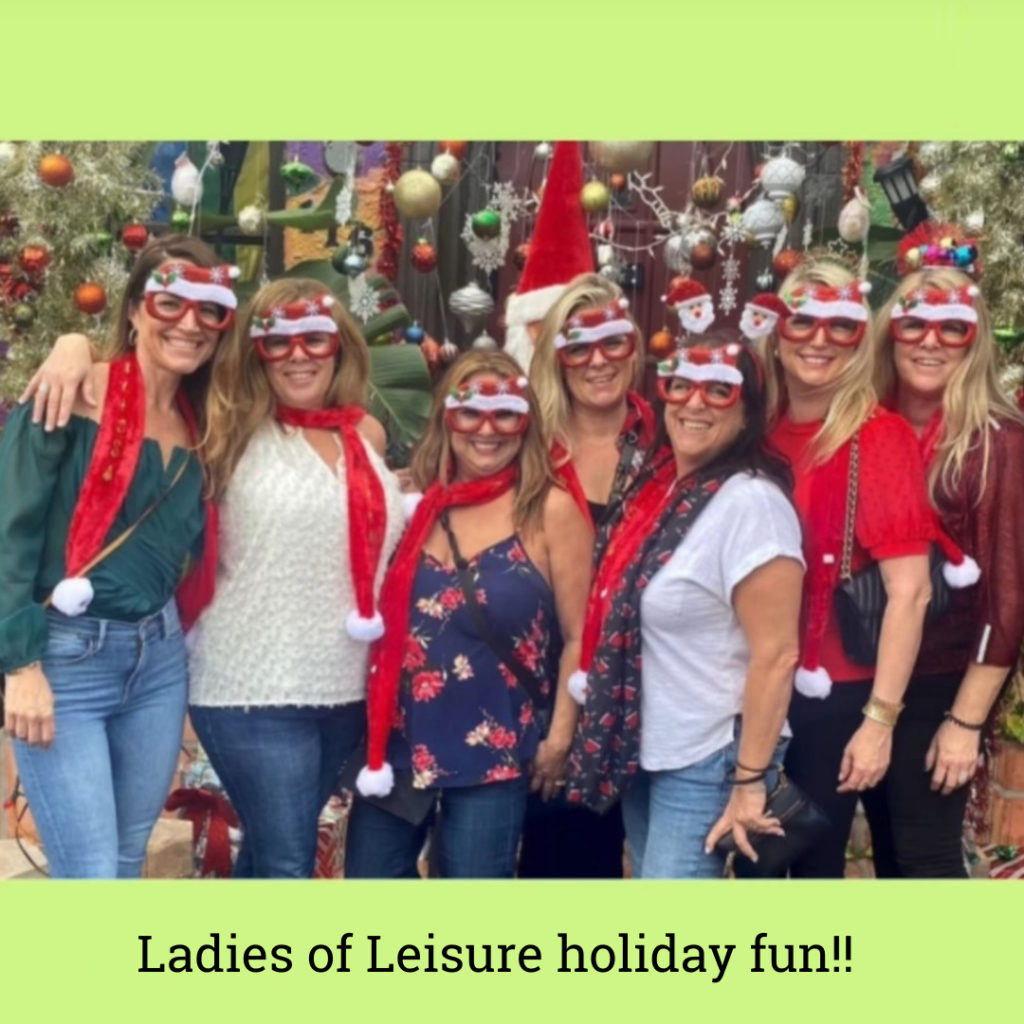 Group of ladies in funny glasses for Secret Santa Party