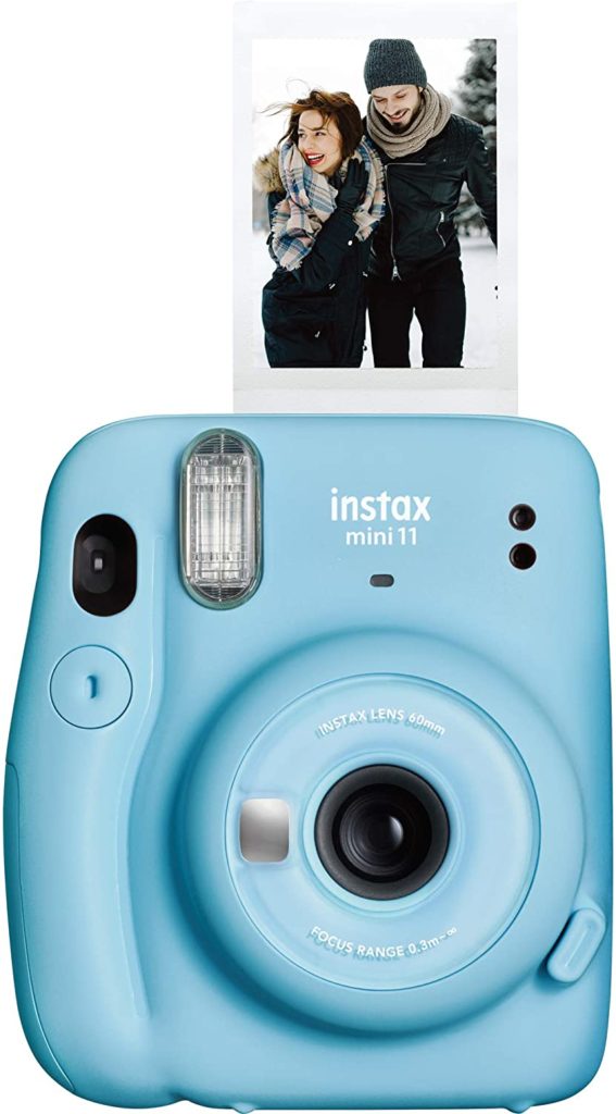 Instax Mini 11 Instant Camera in light blue with photo of couple