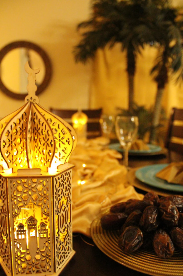 Eid celebration with lantern and dates