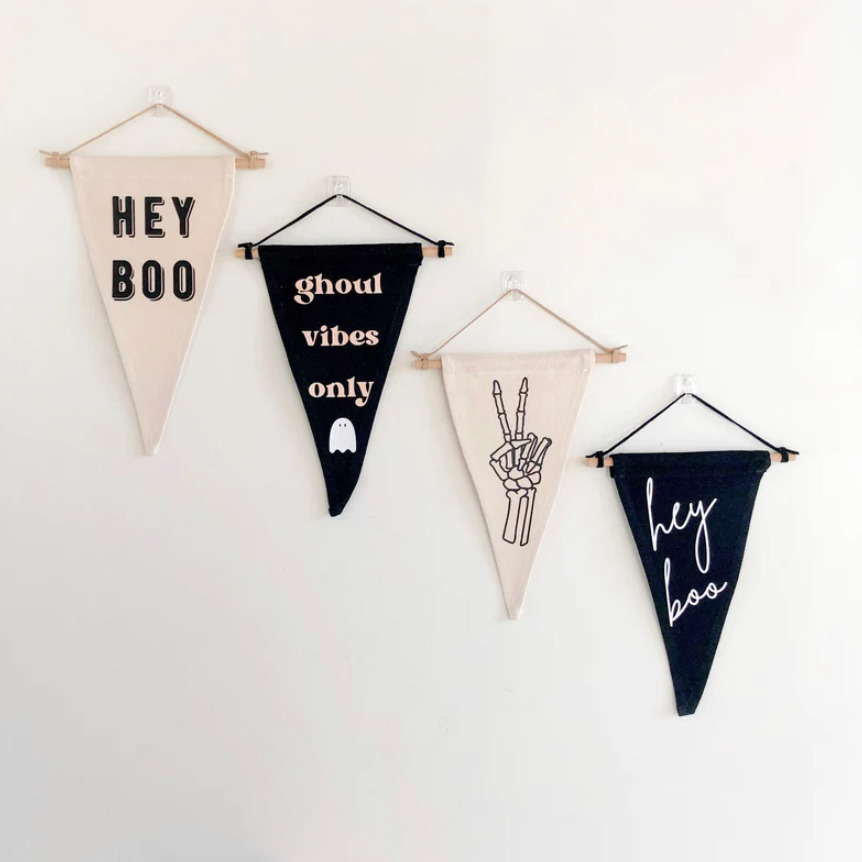 Four hanging pennants with Halloween sayings