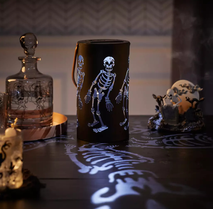 Skeleton lantern that casts ghostly images from Disney's The Skeleton Dance short