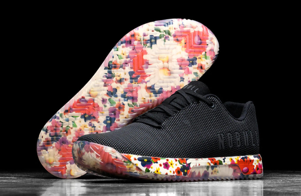 Black sneakers with words NO BULL on the side and floral sides and soles
