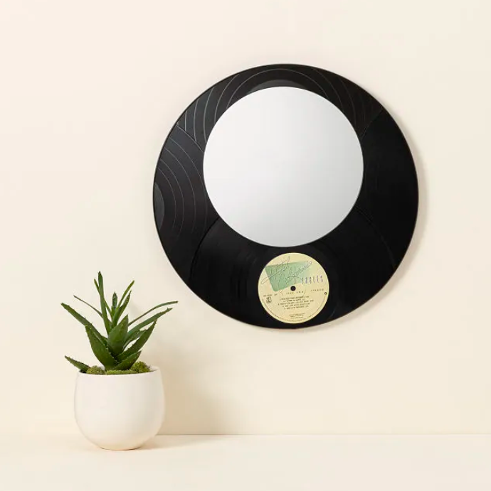 Repurposed vinyl record made into wall mirror