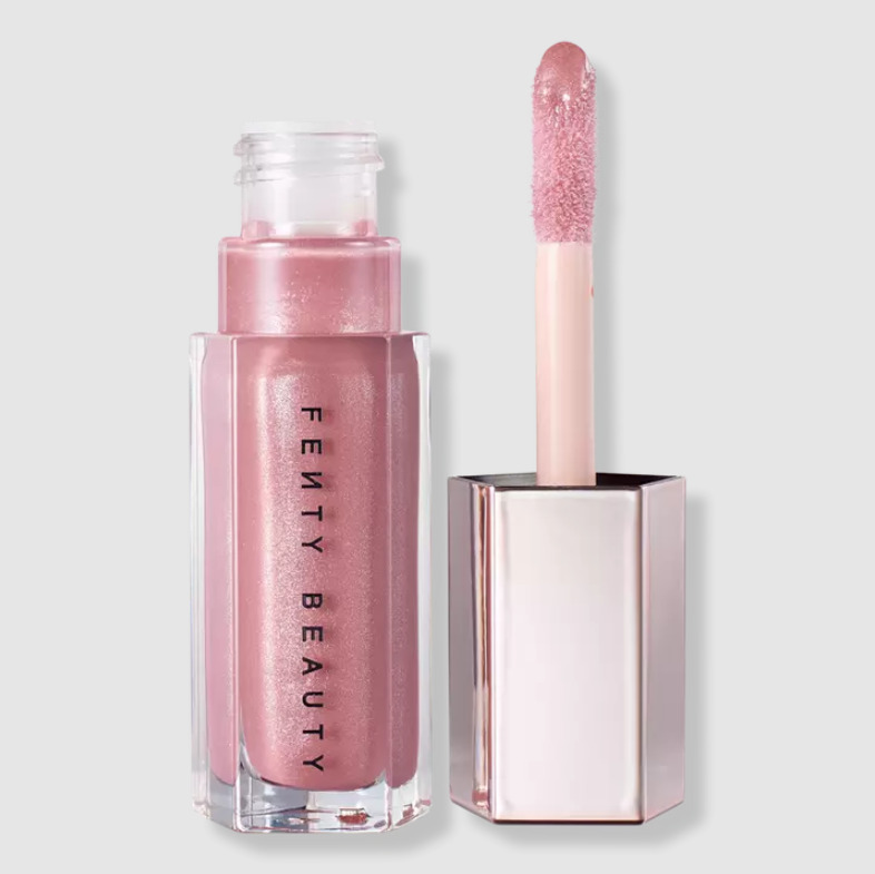 Pink lip gloss by Fenty Beauty with small bottle and applicator